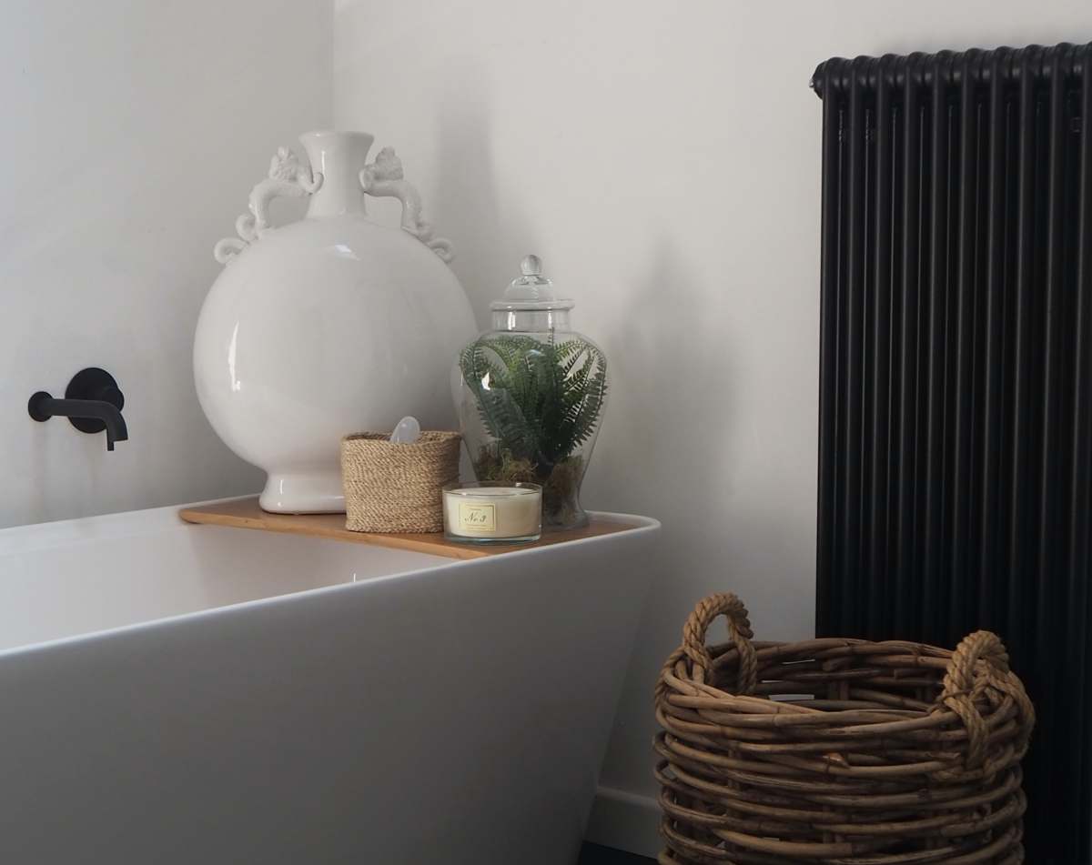 grey round brown wicker basket bathroom